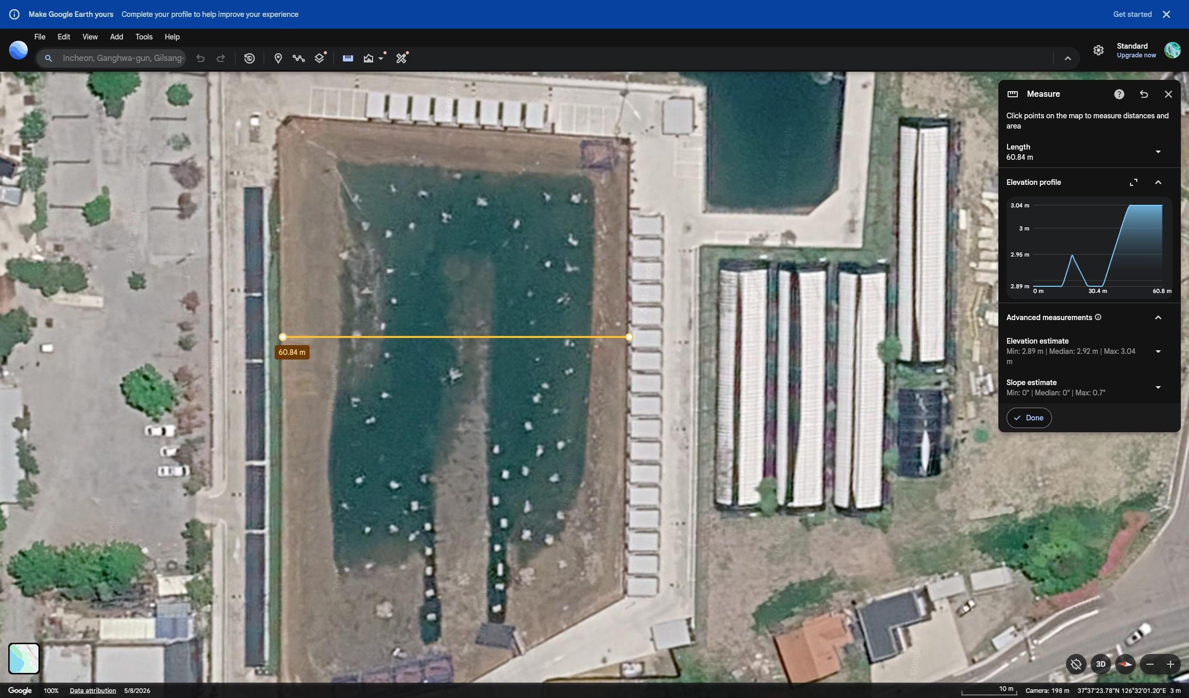 Google Earth 거리 도구에서 호안 사이 폭 60.84미터를 판독한 화면